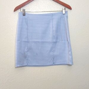 PRE OWNED HERPERUS SKIRT MAY BE LIGHT STAIN ON FRONT OF SKIRT SIZE M  SEE PHOTOS